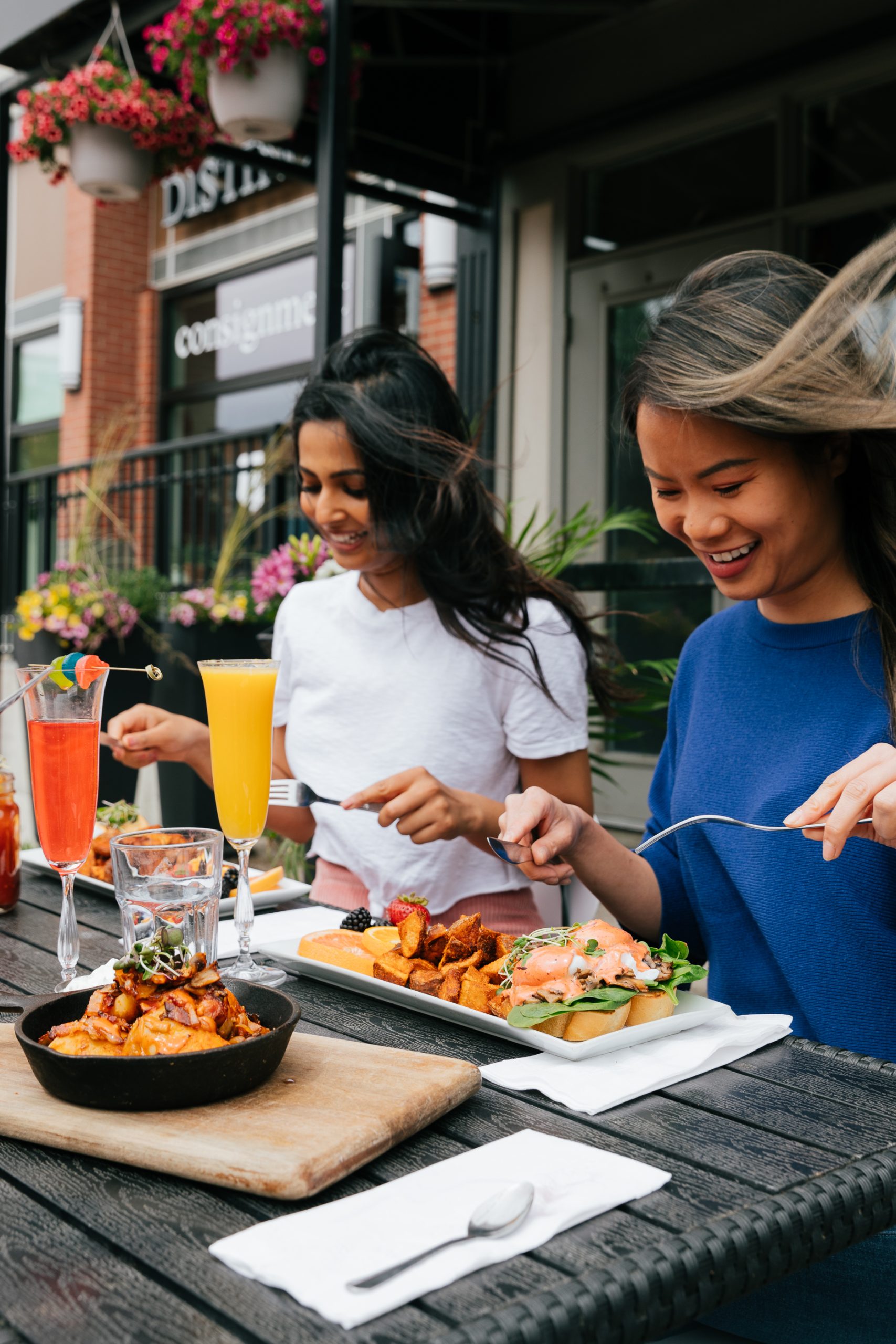 Women enjoying breakfast in patio